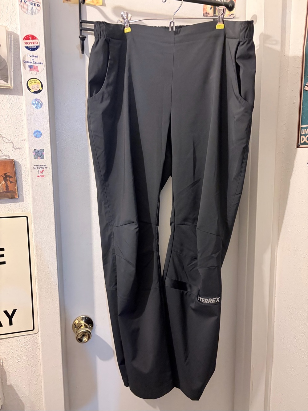Adidas- size XL- Women’s black Terrex pants with tie waist, pockets, hem snaps.